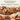 Cooked meat with a thermometer probe on a grill, featuring text about probe combo and product features.